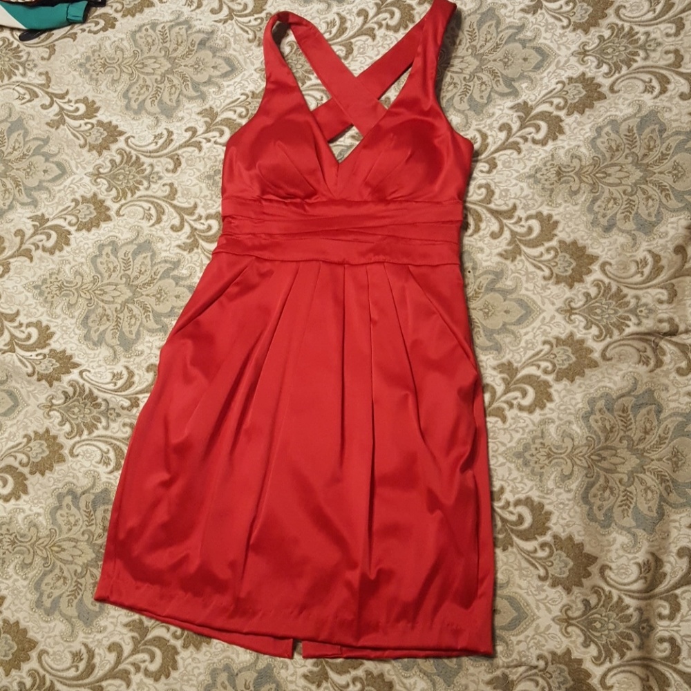 Red cocktail dress with criss cross back & pockets